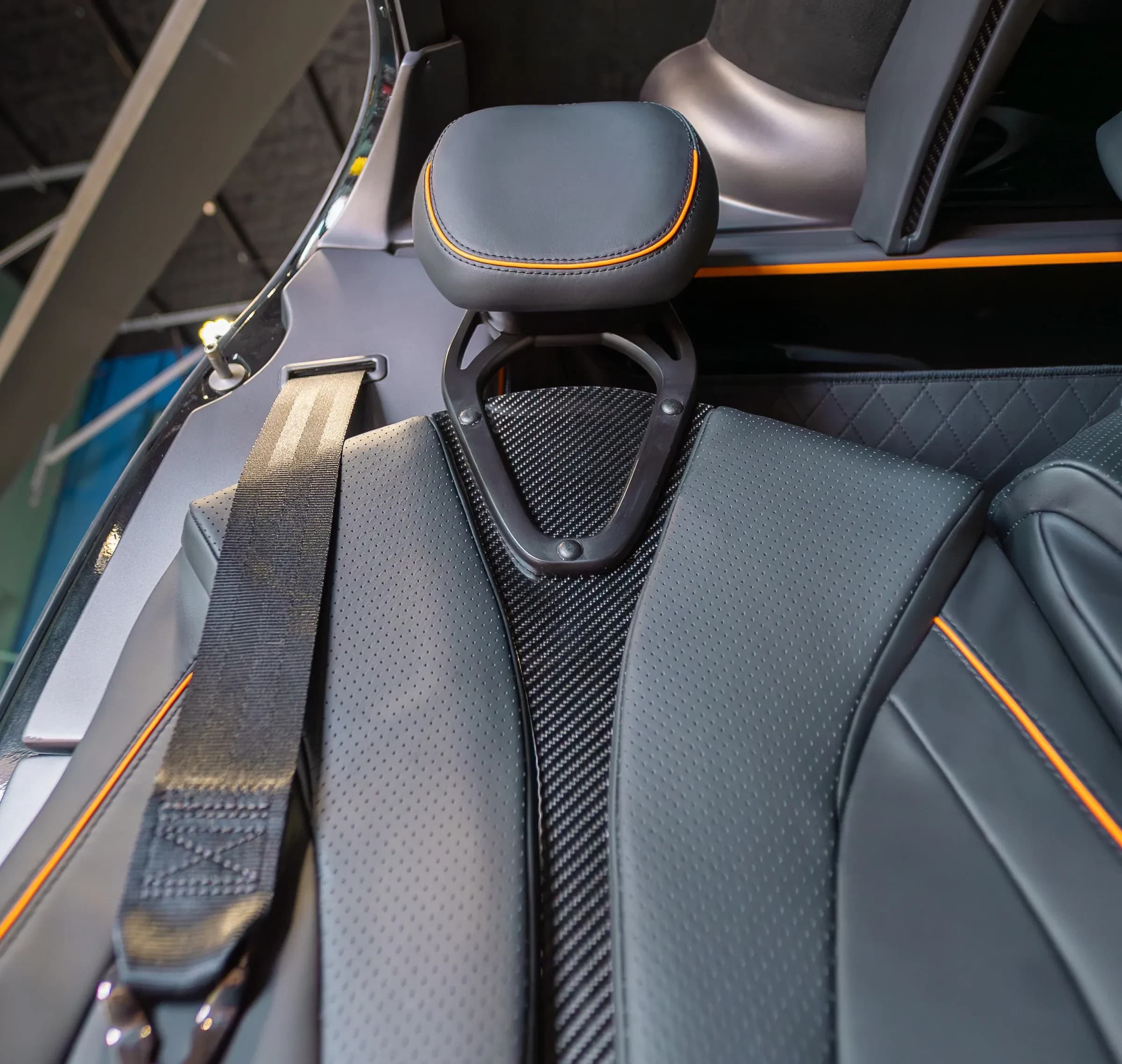 Bell 407 headrest, shoulder belt and woven-pattern trim detail.