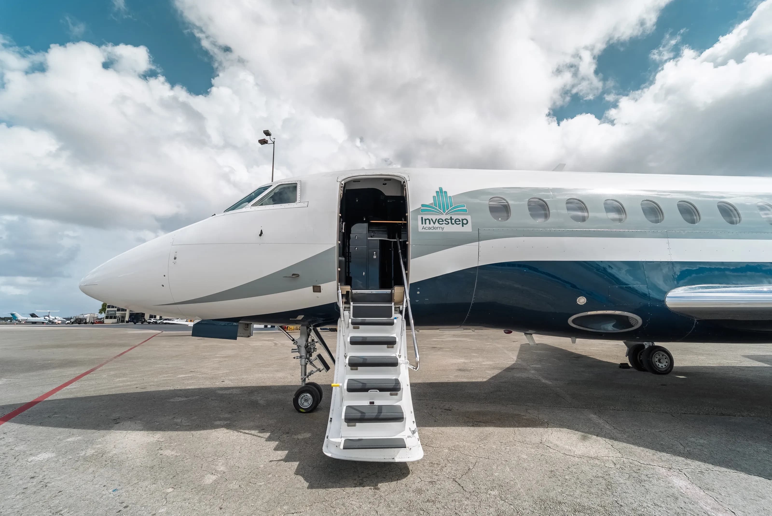 Falcon 2000 nose and open cabin entrance with the stairs extended.