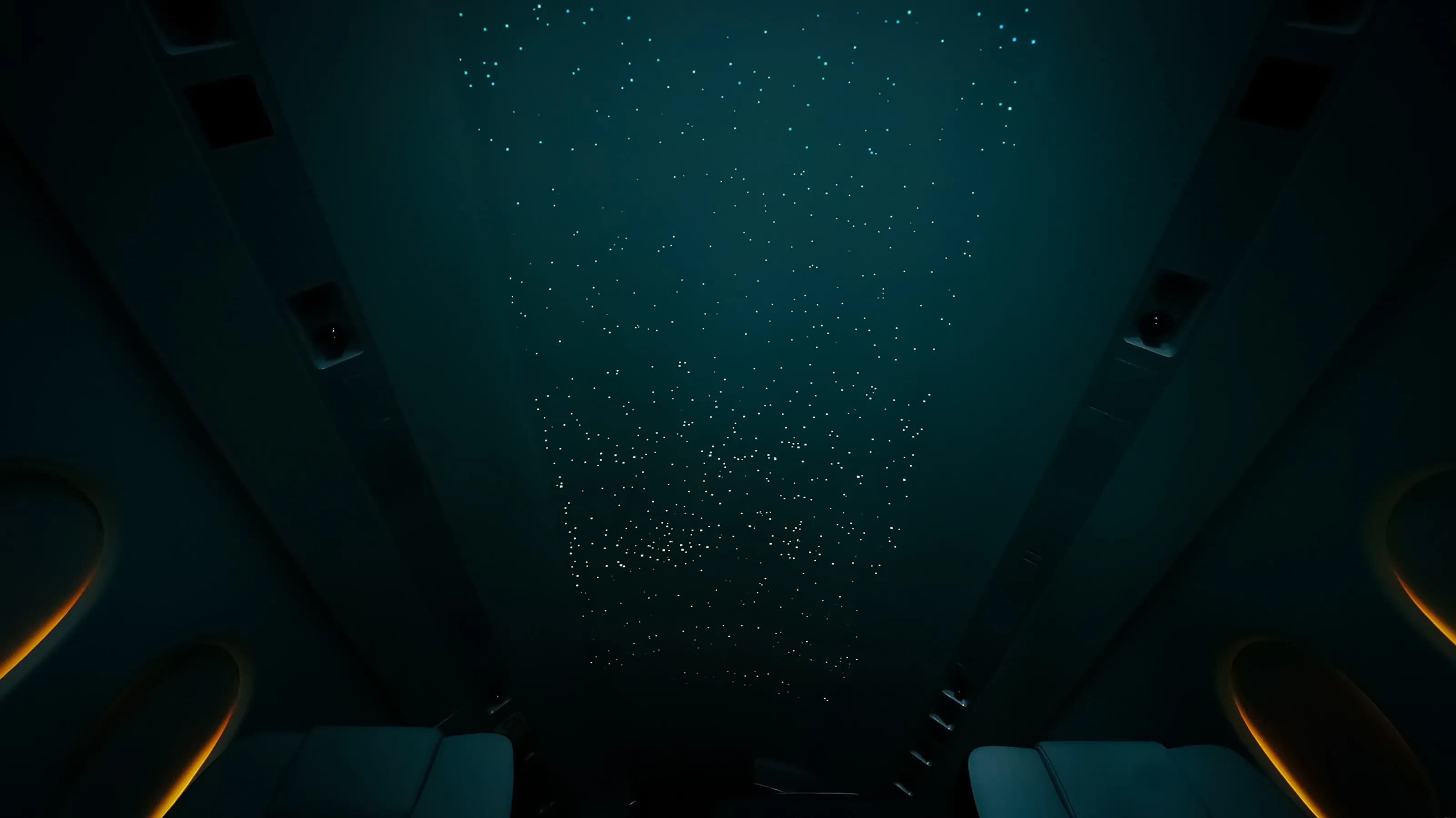 Falcon 2000 illuminated ceiling with the surrounding overhead panels visible in low light.