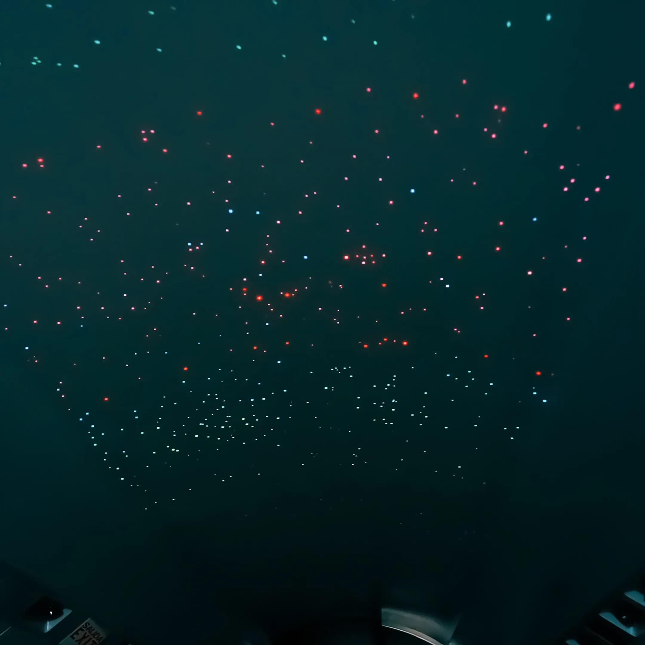 Close upward view of the Falcon 2000 ceiling lighting pattern.