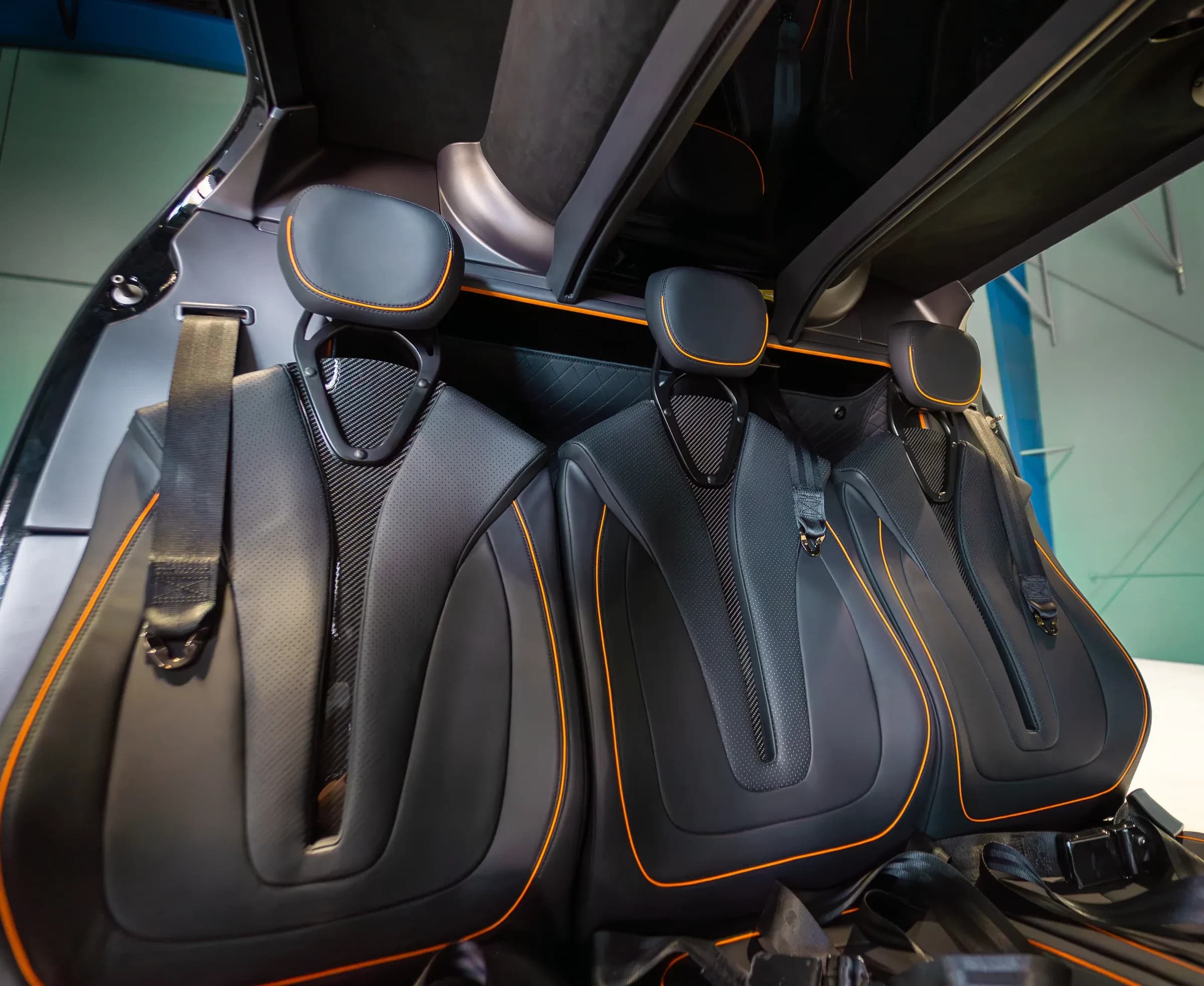 Upper Bell 407 passenger seat backs, headrests and cabin ceiling.