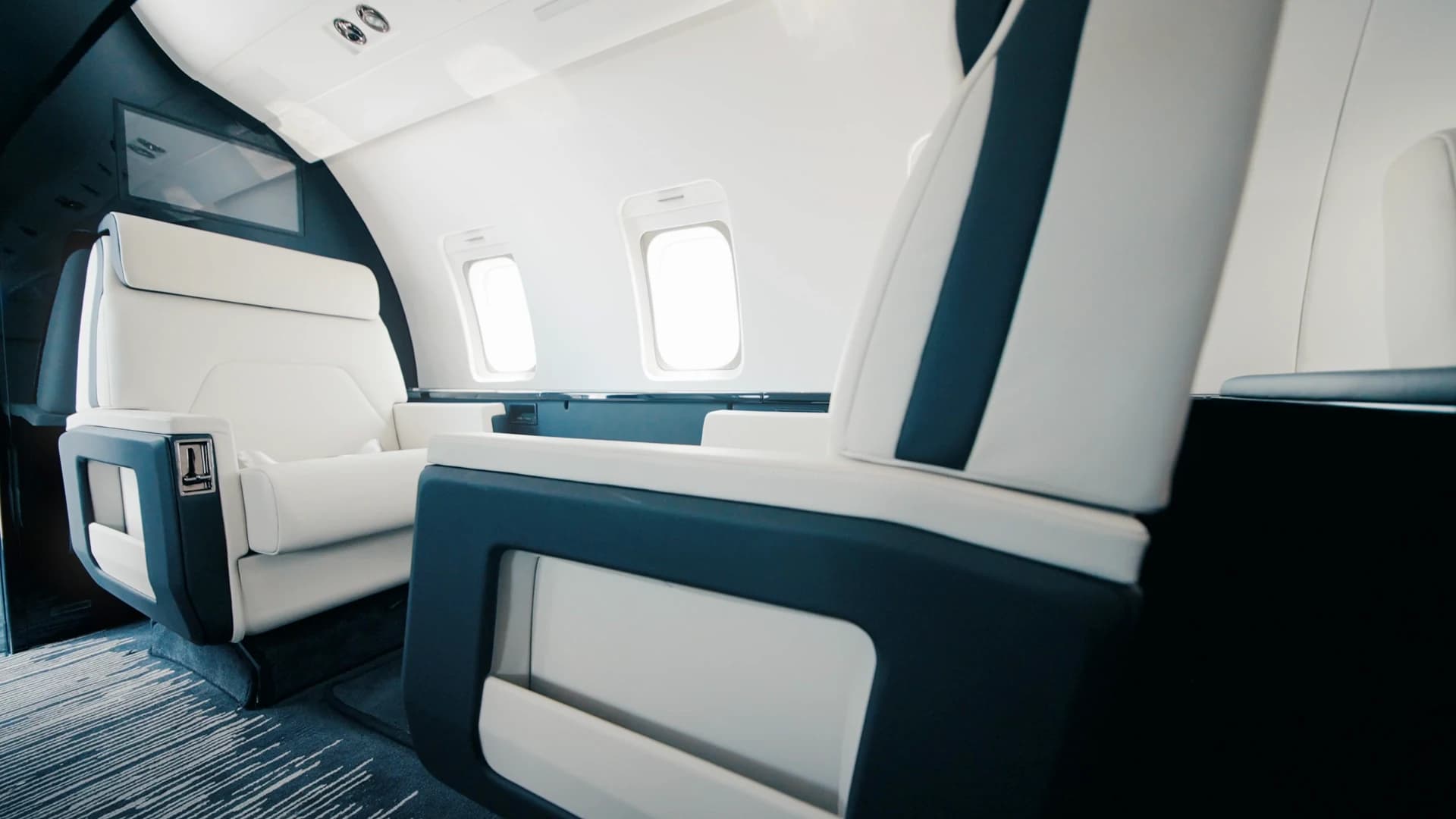 Challenger 604 leather seating and window line.