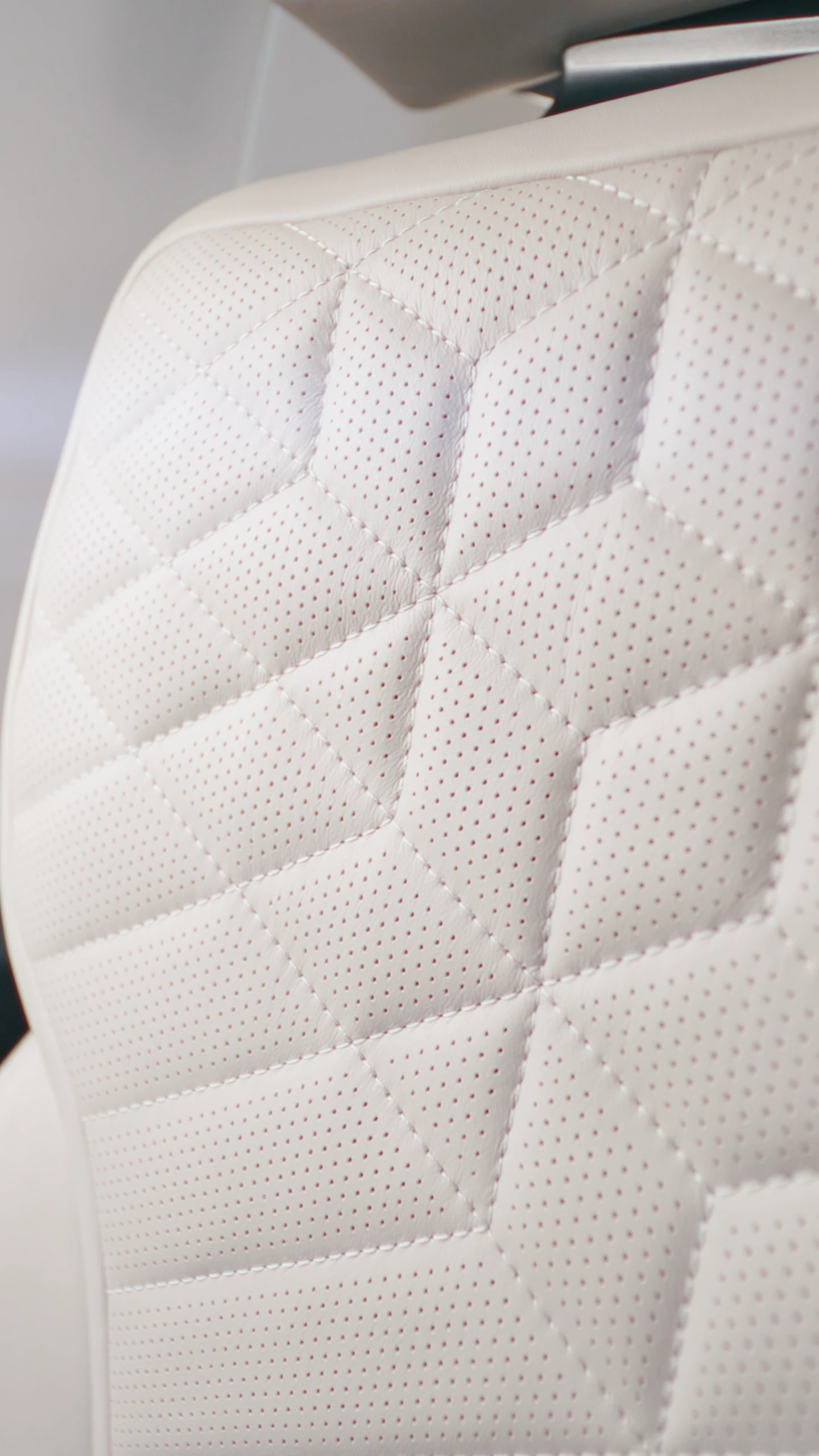 Citation III Mutati — white perforated upholstery and geometric stitching, from the original Rex project film